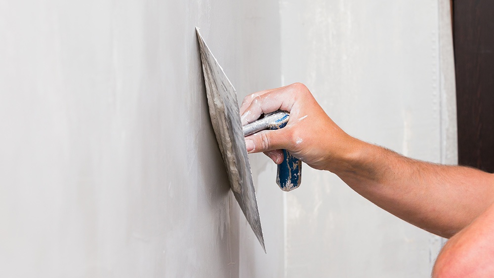 drywall trowel skim coating wall